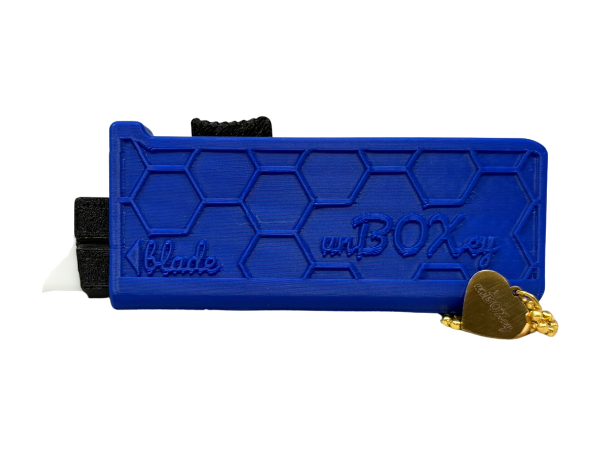 unBOXey™ VOILÀ Experience - Self-Retracting Box Cutter for the Joy of unBOXing