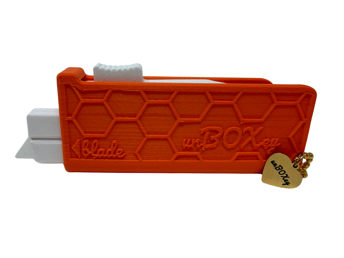 unBOXey™ VOILÀ Experience - Self-Retracting Box Cutter for the Joy of unBOXing